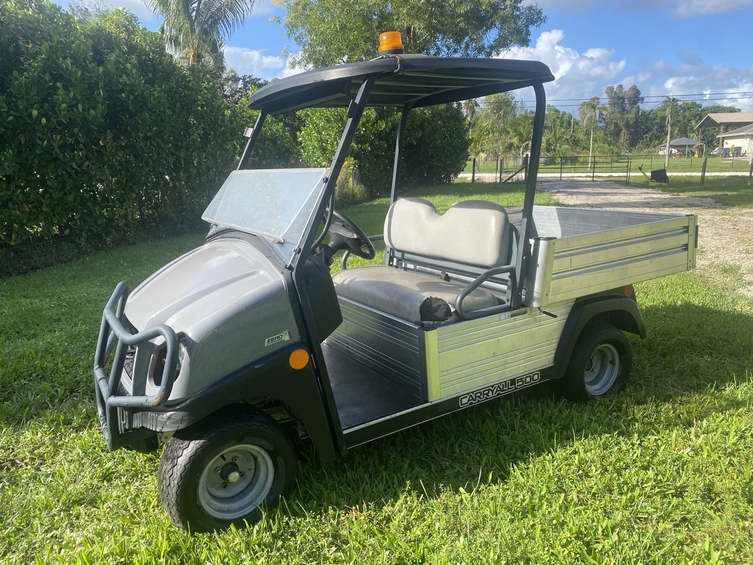 Club Car Carryall 500 with aluminum dump bed — actual item photo