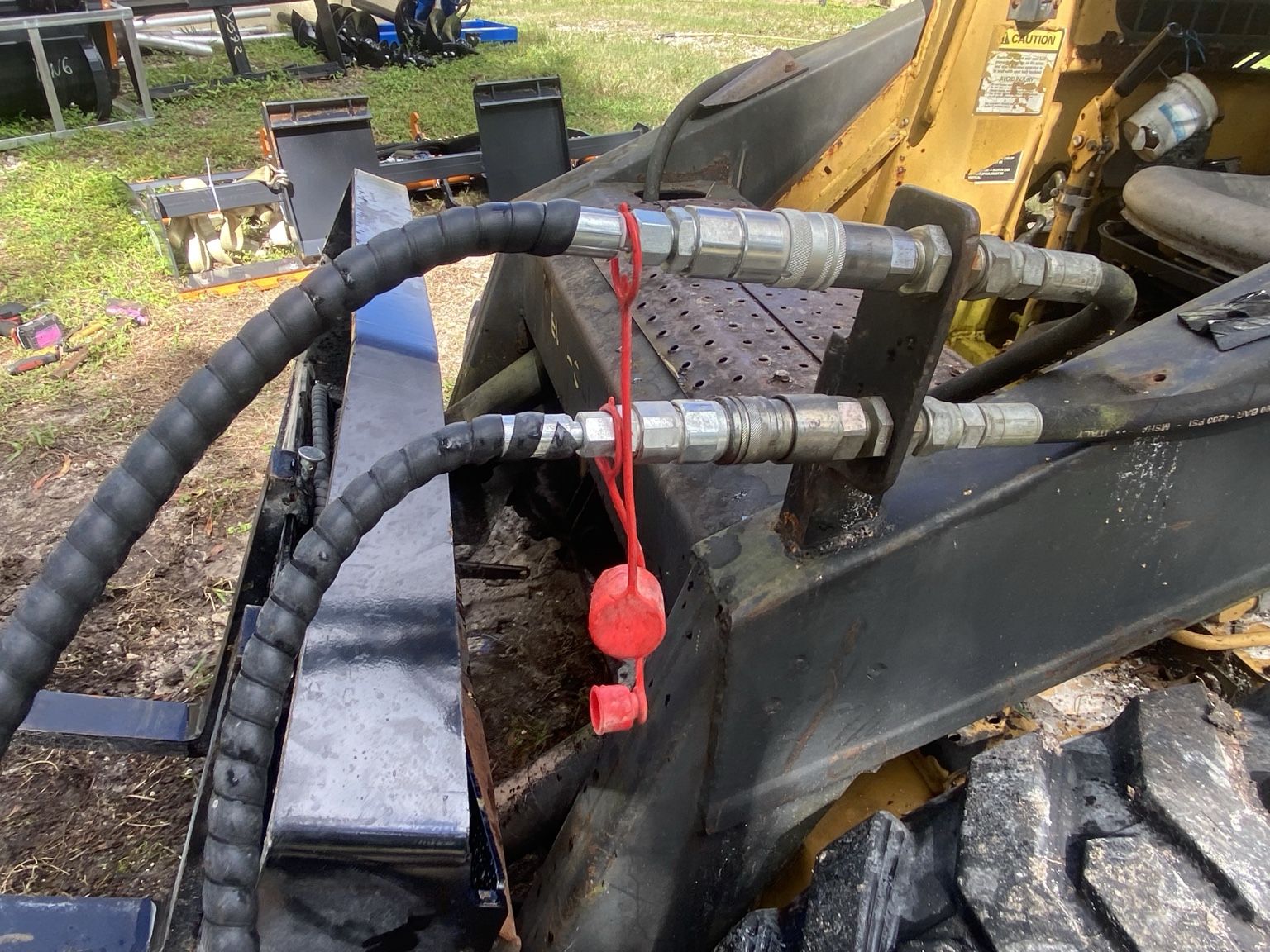 Hydraulic hoses and quick couplers · Actual item photo