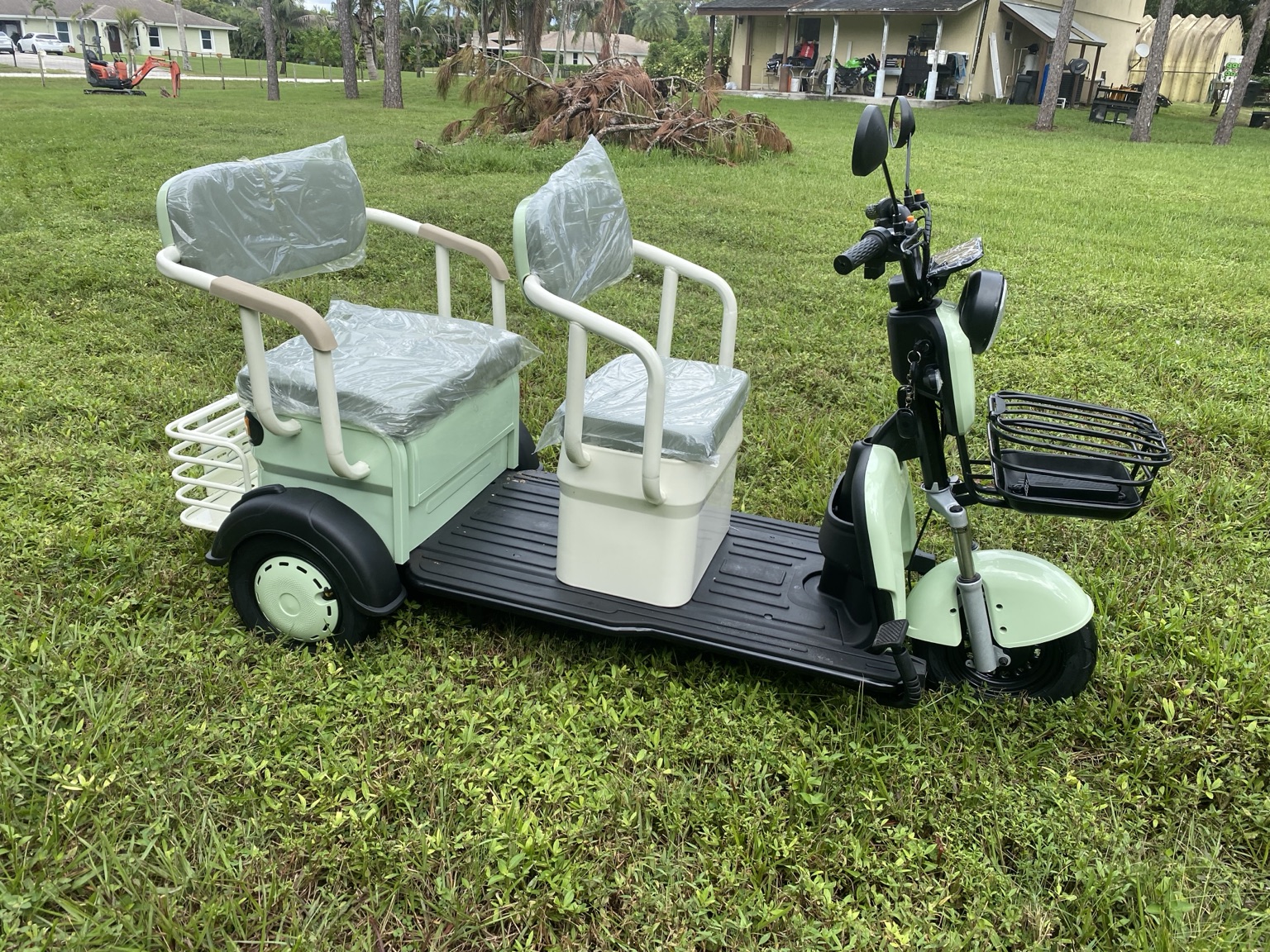 Mint green MGC40 two-seat electric trike — actual item photo